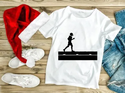 Silhouette of a football player running with the ball on a field
