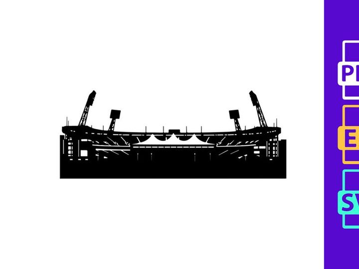 Concert stage setup in front of a city skyline at night