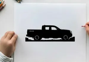 Silhouette of a pickup truck against a white background