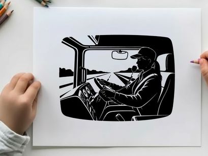 Silhouette of a truck driver driving on the highway in his vehicle