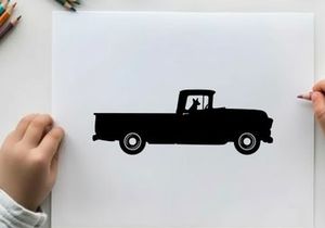Silhouette of a classic pickup truck with a dog