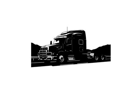 Silhouette of a large truck driving on a highway with mountains