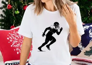 American football player in motion running with helmet and pads
