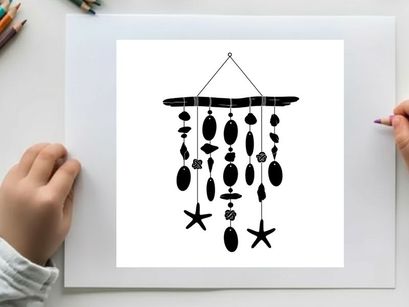 Silhouette of a seashell and starfish wind chime decoration