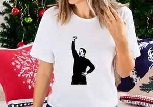 A man with his fist raised in a gesture of triumph or defiance