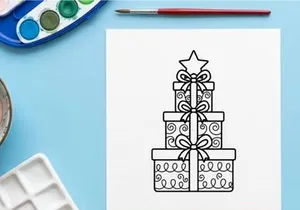 Stacked Christmas gift boxes with ribbons and star topper for holiday celebration