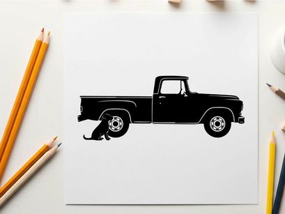 Silhouette of a pickup truck with a dog