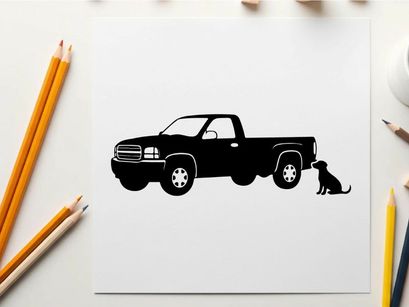 Silhouette of a pickup truck with a dog