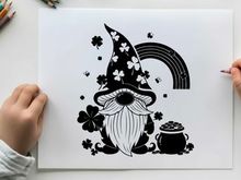 St patrick's day gnome silhouette with rainbow and shamrocks