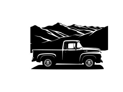 Vintage truck silhouette against majestic mountain range