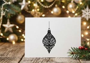Elegant black ornate Christmas lantern hanging for holiday decor