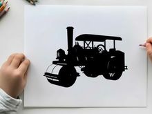 Silhouette of a vintage steam roller tractor