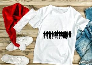 Silhouette of a group of people running together in unison