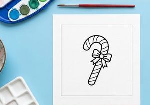 Hand-drawn candy cane with red bow for festive Christmas holiday celebration decor
