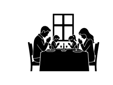 Family in silhouette praying at dinner table together preview picture