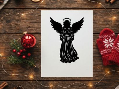 Black silhouette of a Christmas angel with wings and halo isolated on white background