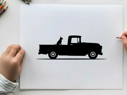 Silhouette of a dog in a vintage pickup truck