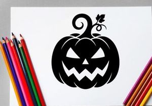 Calabaza de Halloween con cara tallada y adorno de hoja