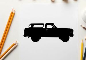 Silhouette of a classic pickup truck with a white background