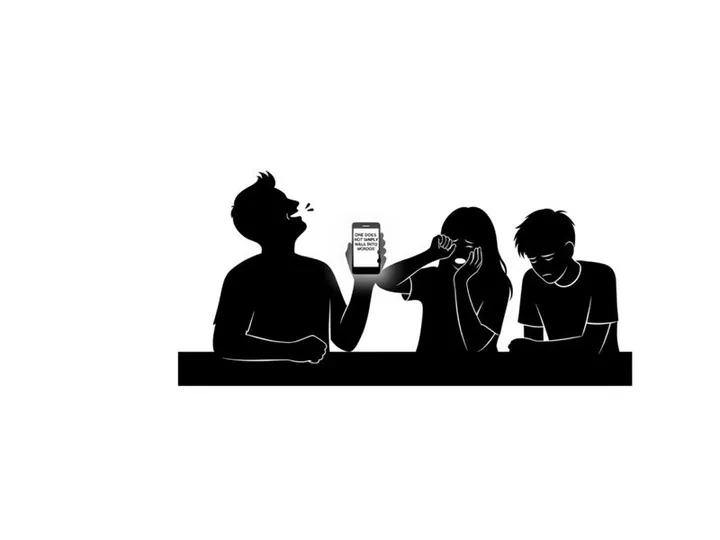 Silhouette of three people looking at a phone in a row