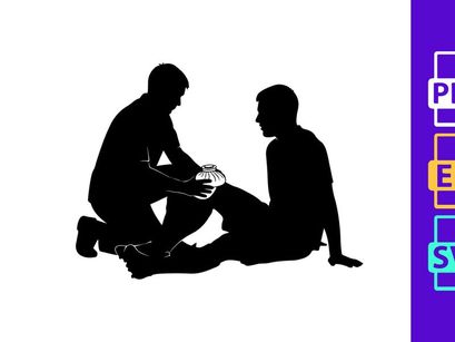 Two men sitting on the ground in silhouette one examining the other's leg