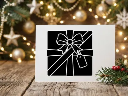 Black and White Gift Box with Ribbon and Tag for Christmas or Holiday