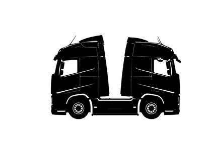 Silhouette of a semi truck with two driver cabins