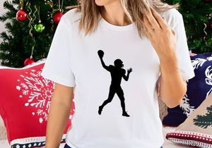American football player in action throwing a ball