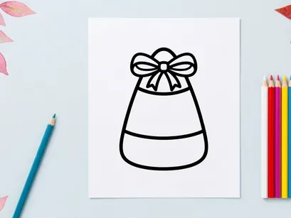 Candy corn icon with a bow. Halloween treat graphic for seasonal holiday design projects.