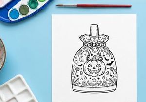 Halloween perfume bottle with smiling jack-o-lantern design. Spooky scented glass container featuring festive bat and ghost patterns for seasonal d...