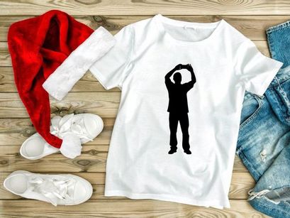 A silhouette of a man standing with his arms raised above his head in a gesture