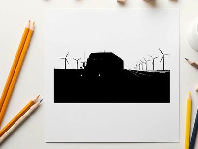 Silhouette of a truck driving past wind turbines on a highway