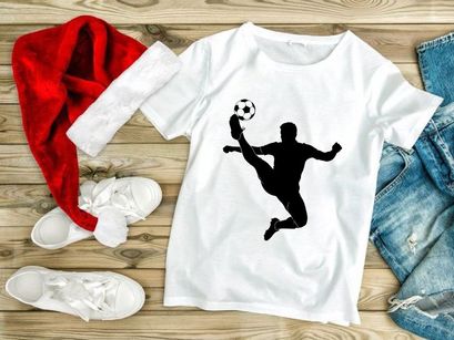 Soccer player kicking a ball in mid air with dynamic movement and skill