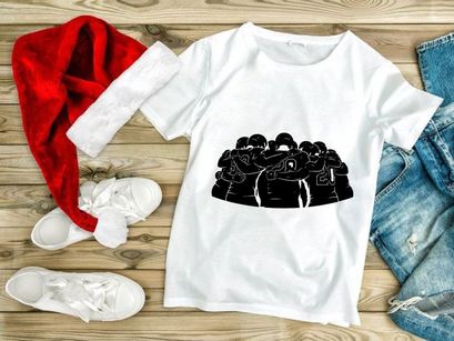 A group of football players huddled together in a circle for a team strategy