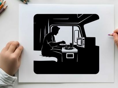 Silhouette of a man sitting in a camper van cooking