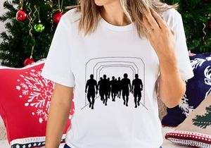 Silhouettes of people running through a tunnel
