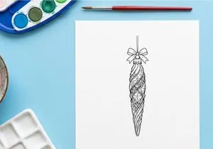 Christmas tree ornament bauble line art drawing with a decorative bow hanging isolated