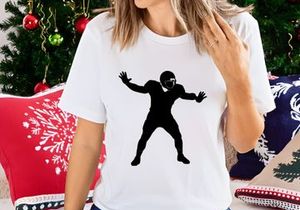 American football player in defensive stance silhouette