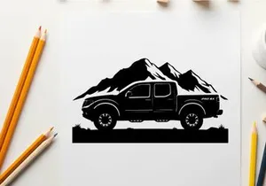 Silhouette of a pickup truck in front of mountains