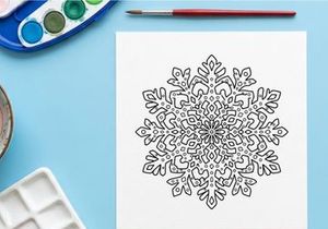Intricate snowflake line art illustration for Christmas holiday design and winter decor.
