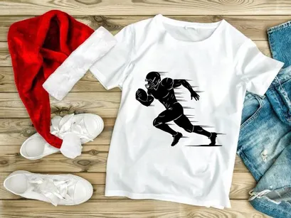 American football player running with ball in motion blur