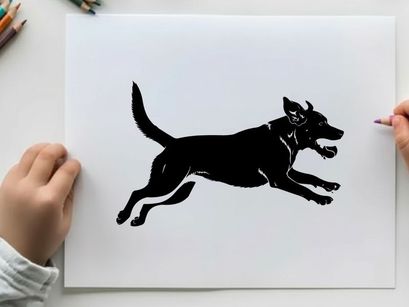 Black silhouette of a dog running quickly to the right