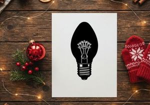 Black and white silhouette of a classic incandescent light bulb icon