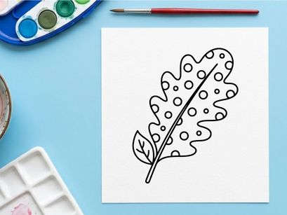 Hand drawn oak leaf with polka dots. Cute doodle style autumn foliage icon.