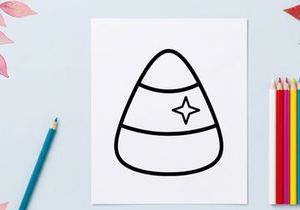 Candy corn icon. Minimalist Halloween treat graphic for seasonal holiday design projects.