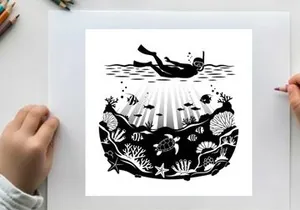 Silhouette of scuba diver exploring coral reef with marine life