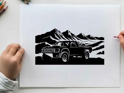 Silhouette of a pickup truck in front of majestic mountains silhouette