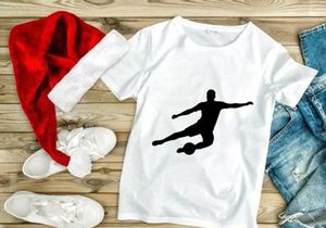 Soccer player kicking a ball in mid air motion silhouette