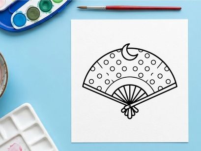 Hand holding decorative Halloween paper fan. Spooky party accessory with ghost and polka dot design for festive celebrations.
