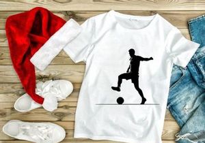 A soccer player kicking a ball in a dynamic pose on the field